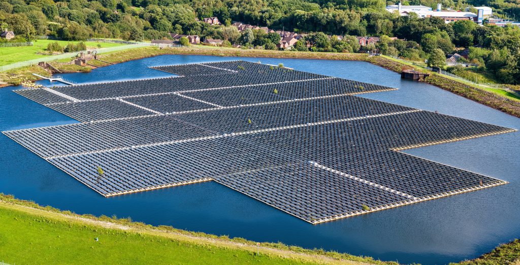 Aerial image of floating solar energy panels in Manchester, United Kingdom.